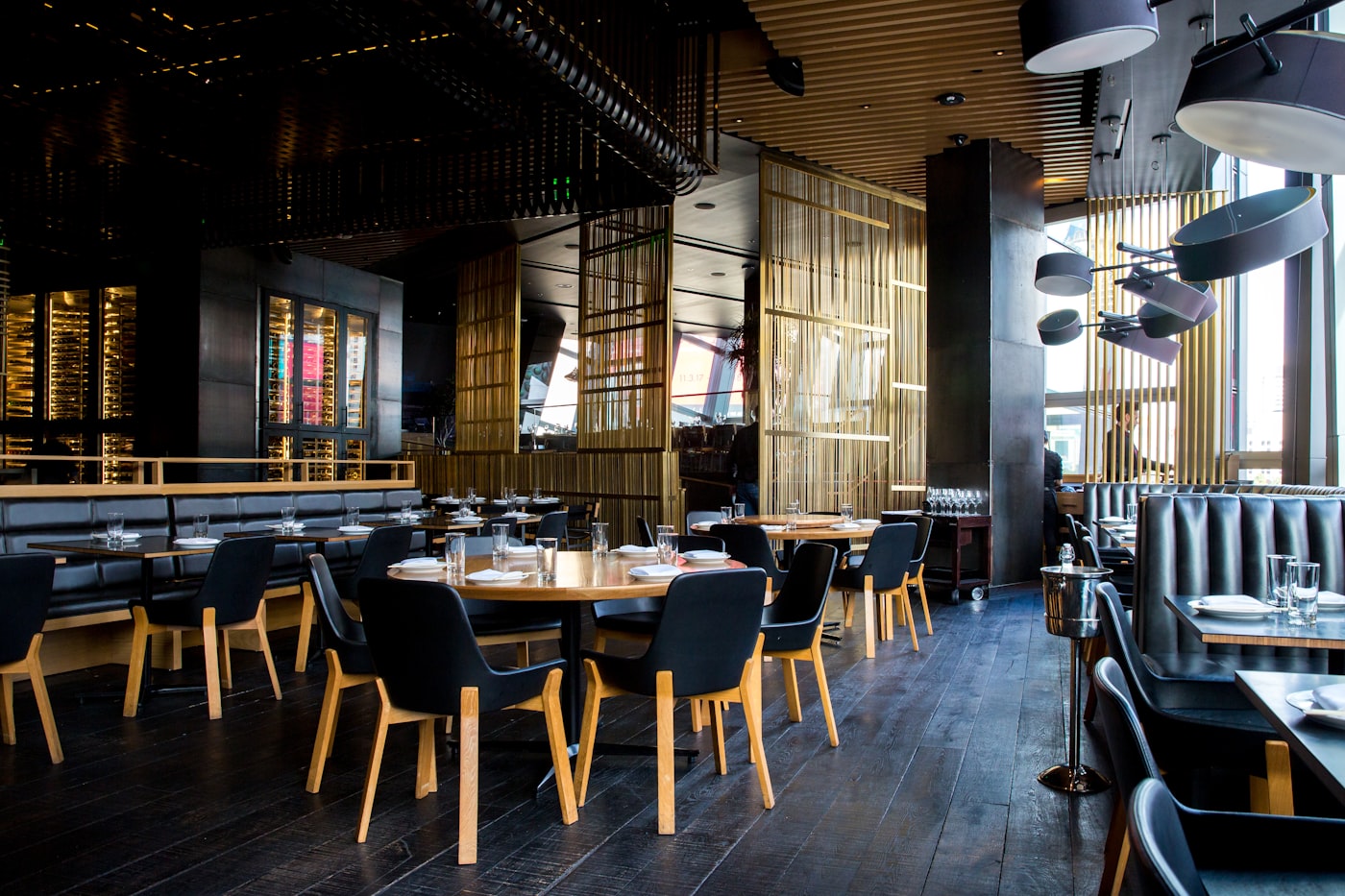A warm, full restaurant dining room